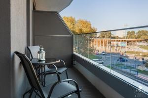 A balcony or terrace at Jantar Apartamenty - Baltic Marina Residence