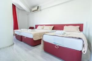 Postel nebo postele na pokoji v ubytování YAŞAM HOTEL