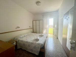 Voodi või voodid majutusasutuse Hotel Vianello toas