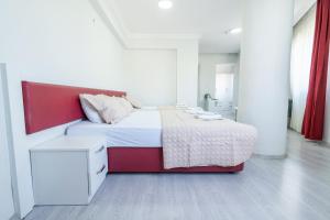 Postel nebo postele na pokoji v ubytování YAŞAM HOTEL