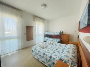 Voodi või voodid majutusasutuse Hotel Vianello toas