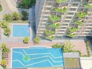an aerial view of an apartment complex with a swimming pool at Mây Homestay in Hanoi
