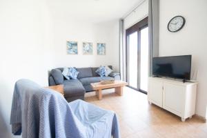A television and/or entertainment centre at The Olive Garden-Almyrida