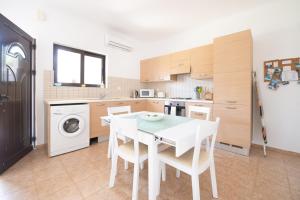 A kitchen or kitchenette at The Olive Garden-Almyrida