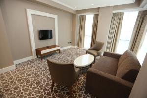 TV a/nebo společenská místnost v ubytování ALUSSO THERMAL HOTEL SPA