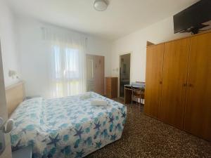 Voodi või voodid majutusasutuse Hotel Vianello toas