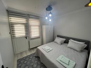 Postel nebo postele na pokoji v ubytování Hk Apart Trabzon