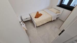 Postel nebo postele na pokoji v ubytování ApartSense
