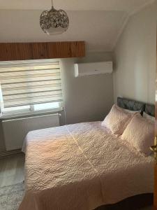 Postel nebo postele na pokoji v ubytování Hk Apart Trabzon