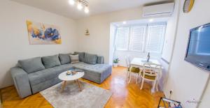 Posezení v ubytování Apartment Fidena