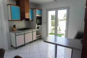 Η κουζίνα ή μικρή κουζίνα στο Maison charmante