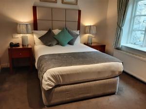 Letto o letti in una camera di Leixlip Manor Hotel