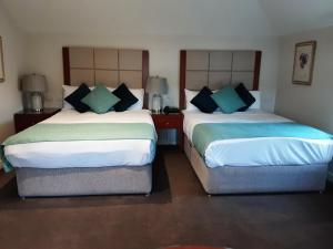 Letto o letti in una camera di Leixlip Manor Hotel