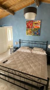 Postel nebo postele na pokoji v ubytování B&B Gronda Via Vandelli