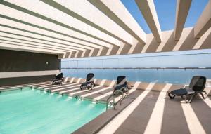 Бассейн в DEPARTAMENTO CON VISTA DESPEJADA AL MAR или поблизости