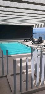 Бассейн в DEPARTAMENTO CON VISTA DESPEJADA AL MAR или поблизости