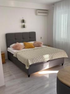 Postel nebo postele na pokoji v ubytování Vila Dvorski