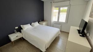 Postel nebo postele na pokoji v ubytování 398-casa con piscina privada