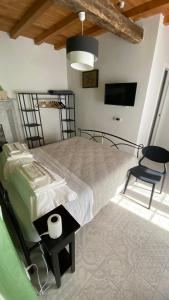 Postel nebo postele na pokoji v ubytování B&B Gronda Via Vandelli