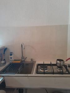 Eldhús eða eldhúskrókur á Cozy apartament