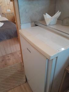 Kuchyň nebo kuchyňský kout v ubytování Cozy apartament + 5 fotografií