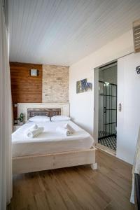 Postel nebo postele na pokoji v ubytování Lunas Alaçatı