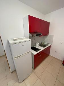 Kuchyň nebo kuchyňský kout v ubytování Villa Popic