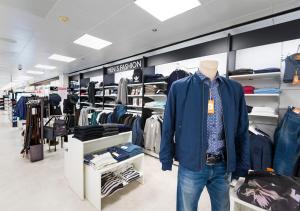 a mannequin standing in a store with a blue jacket at Viking Line ferry Viking Cinderella - One-way journey from Stockholm to Helsinki in Stockholm