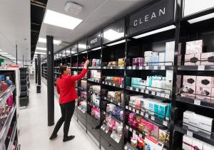 a woman is standing in a store aisle at Viking Line ferry Viking Cinderella - One-way journey from Stockholm to Helsinki in Stockholm