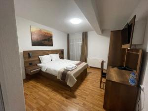 Ein Bett oder Betten in einem Zimmer der Unterkunft Bici Resort
