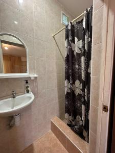 Ванная комната в Отель Каво-де-Буксо