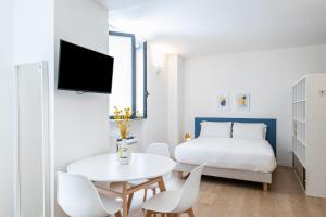 Ένα ή περισσότερα κρεβάτια σε δωμάτιο στο RELSTAY - Porta Romana - Large Studio