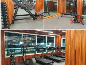 a gym with several tread machines in a room at SALINAS EXCLUSIVE RESORT in Salinópolis