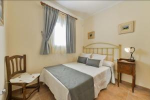 Łóżko lub łóżka w pokoju w obiekcie Villa Evie