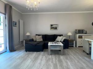 Et opholdsområde på Kleine Villa Marleen, Ferienwohnung