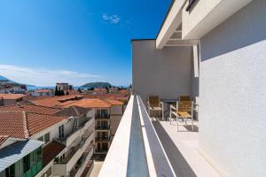 a balcony with a view of the city at Marea Apartments Budva in Budva