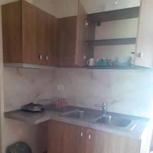 Kuchyň nebo kuchyňský kout v ubytování Bona's Home + 3 fotografie