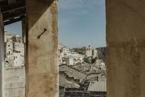 a view of a city from a window at L'Arturo B&B in Matera