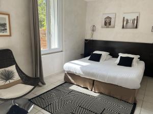 Postel nebo postele na pokoji v ubytování hôtel Le Synaya + 37 fotografií