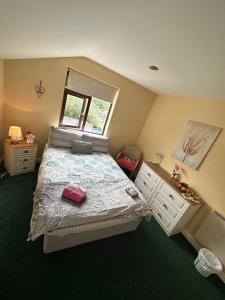 Postel nebo postele na pokoji v ubytování Edwards Cosy B&B + 37 fotografií