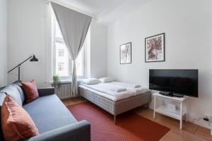 Кровать или кровати в номере 2ndhomes Tampere "Ruuskanen" Apartment - 3 Bedrooms, Best Location & Sauna