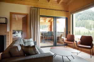 Istumisnurk majutusasutuses Alm-Lodges Montafon by Pferd auf Wolke