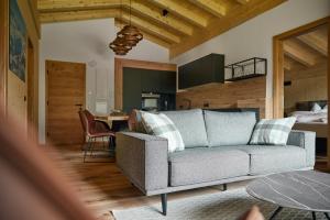 Istumisnurk majutusasutuses Alm-Lodges Montafon by Pferd auf Wolke