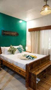 Postel nebo postele na pokoji v ubytování La Colonial Resort