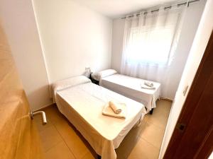 Ένα ή περισσότερα κρεβάτια σε δωμάτιο στο Condado de Alhama NARANJOS 7 SV19 +1 φωτογραφίες