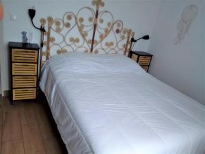 Posteľ alebo postele v izbe v ubytovaní La Terrasse des Golfs, Duplex climatisé, 2 SDB, garage, calme et verdure