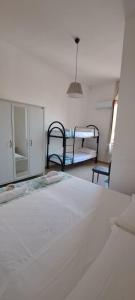 Postel nebo postele na pokoji v ubytování Hotel Canarco