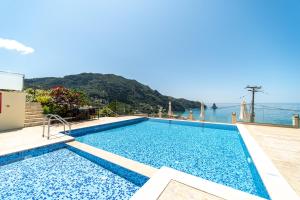 The swimming pool at or close to Mazis Deluxe Apartment