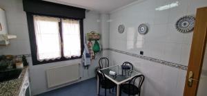 Photo de la galerie de l'établissement Raitán 1 - Dúplex en Colunga para 4 con piscina compartida - VUT-4300-AS, à Colunga