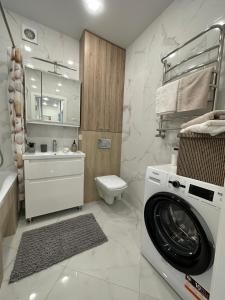 Ένα μπάνιο στο Comfort Apartment +23 φωτογραφίες